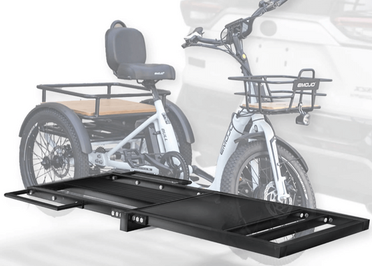 eTrike carrier attached to a car with a Emojo Trike on it, on a white background